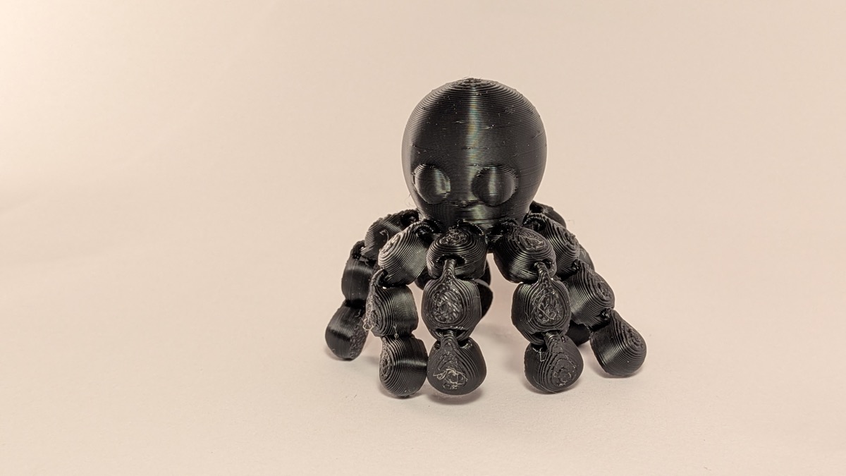 3D printed articulated octopus toy standing up